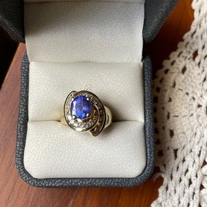 14 K gold with Gorgeous genuine tanzanite and diamond ring